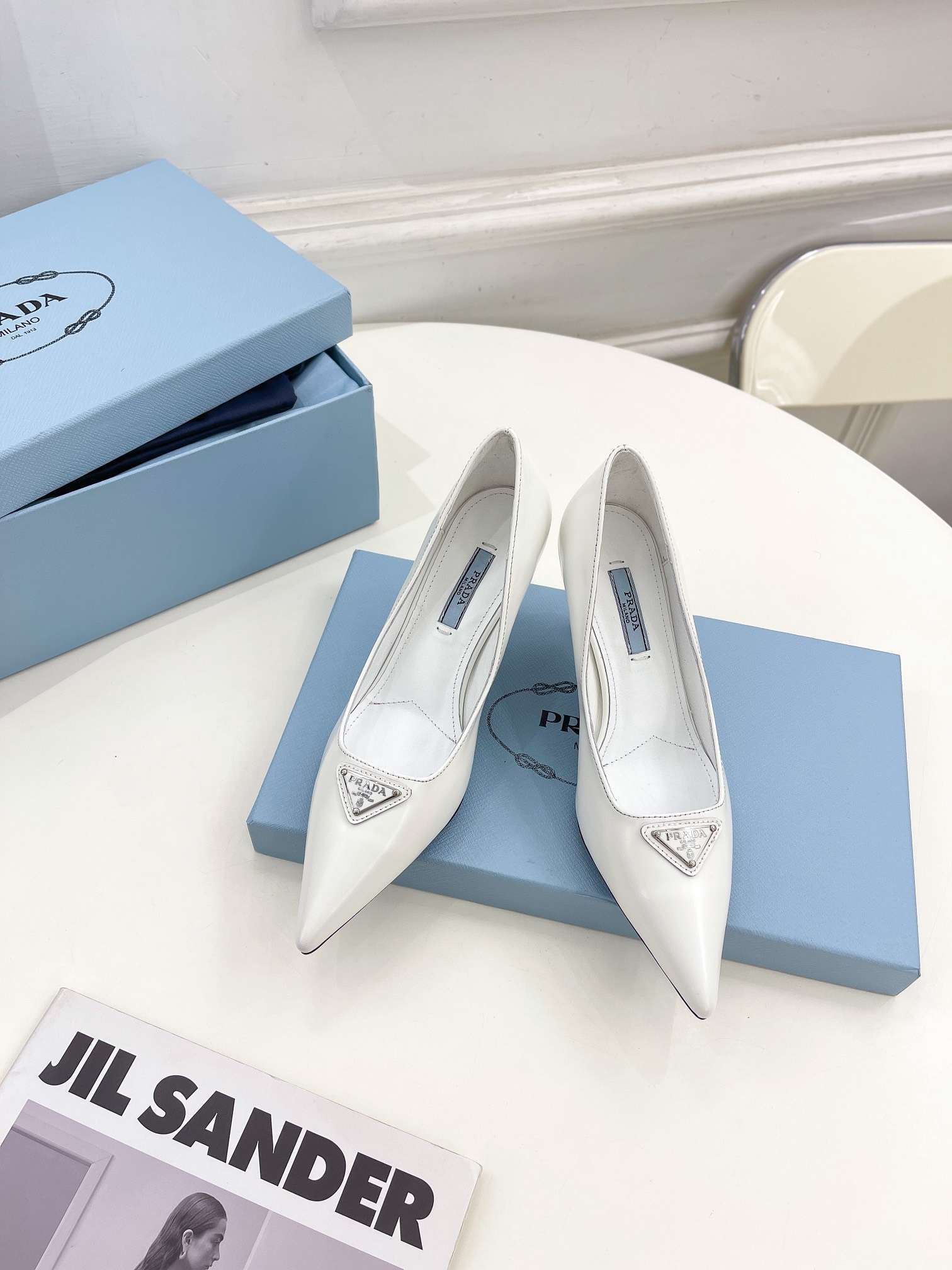 Pra*a Spike Pumps White For Women