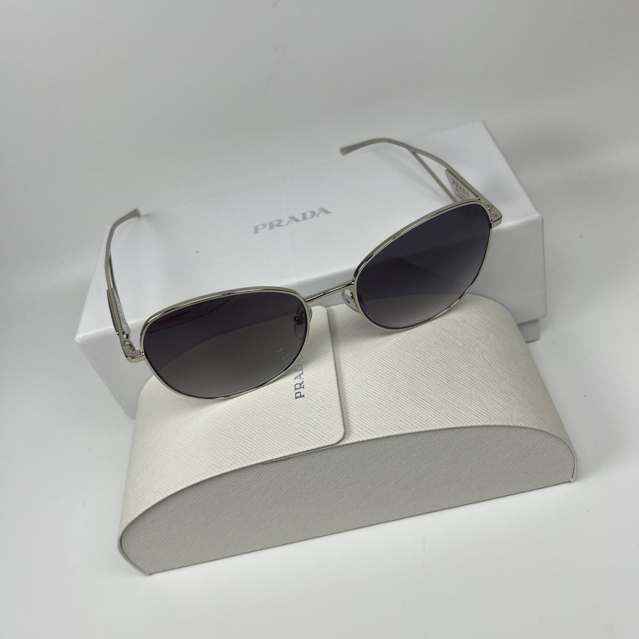 Pra*a Sunglasses With Triangle Logo Silver For Women